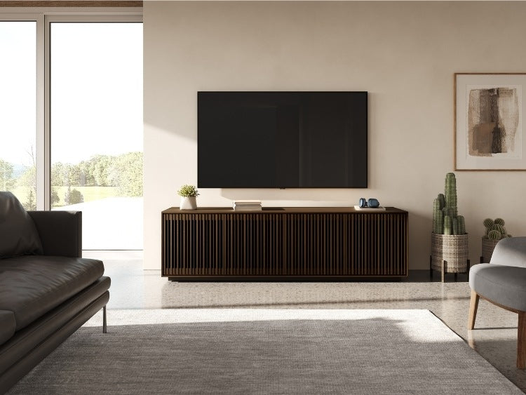 Profile 8479 Cabinet toasted oak front view in home entertainment room with rug