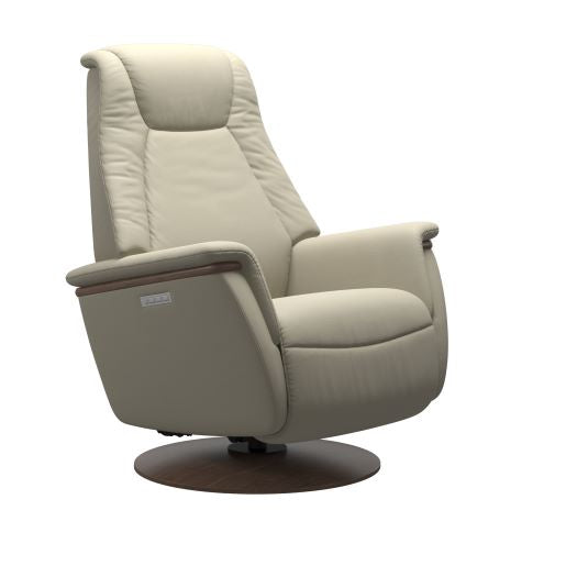 Modern light grey recliner chair with padded cushions and a round dark brown wood base 